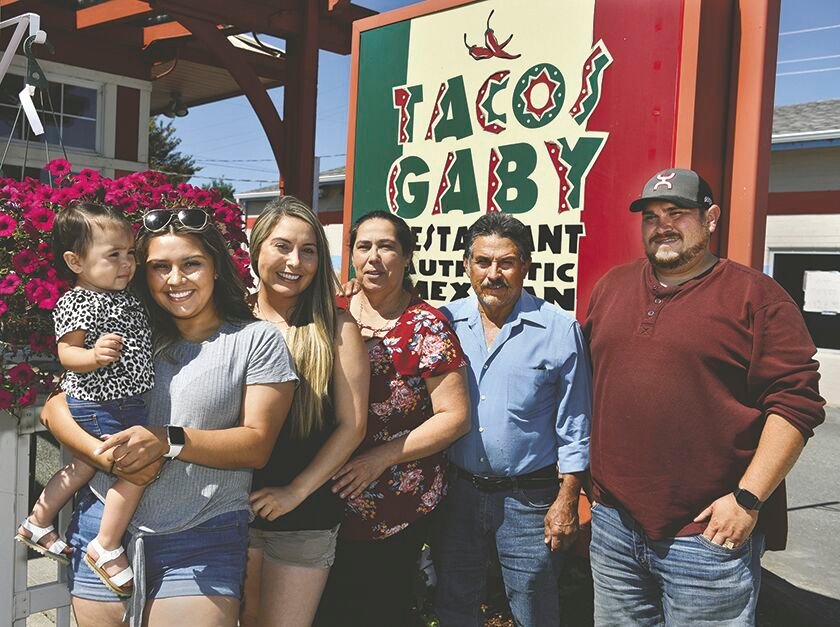 Yelm's Mendez family closed their popular Mexican restaurant Tacos Gaby on July 29 after 12 years at their location at 307 E. Yelm Ave. They are, from left: Liszet Guerrero-Mendez, 1, Melissa Mendez, 21, Gabby Mendez, 27, Martha Mendez, 53, Narciso Mendez, 61, and Jose Mendez, 31.