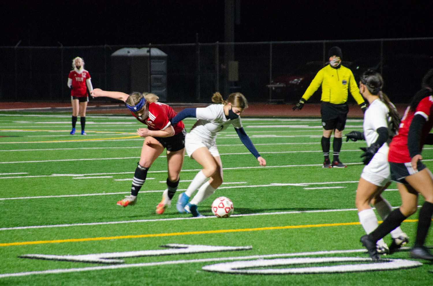 Yelm's Meridee Hill and River Ridge's Taylor Woodworth fight for possession in a Tuesday night matchup. The Tornados were quick off the ball and blew out the Hawks 6-1. 
