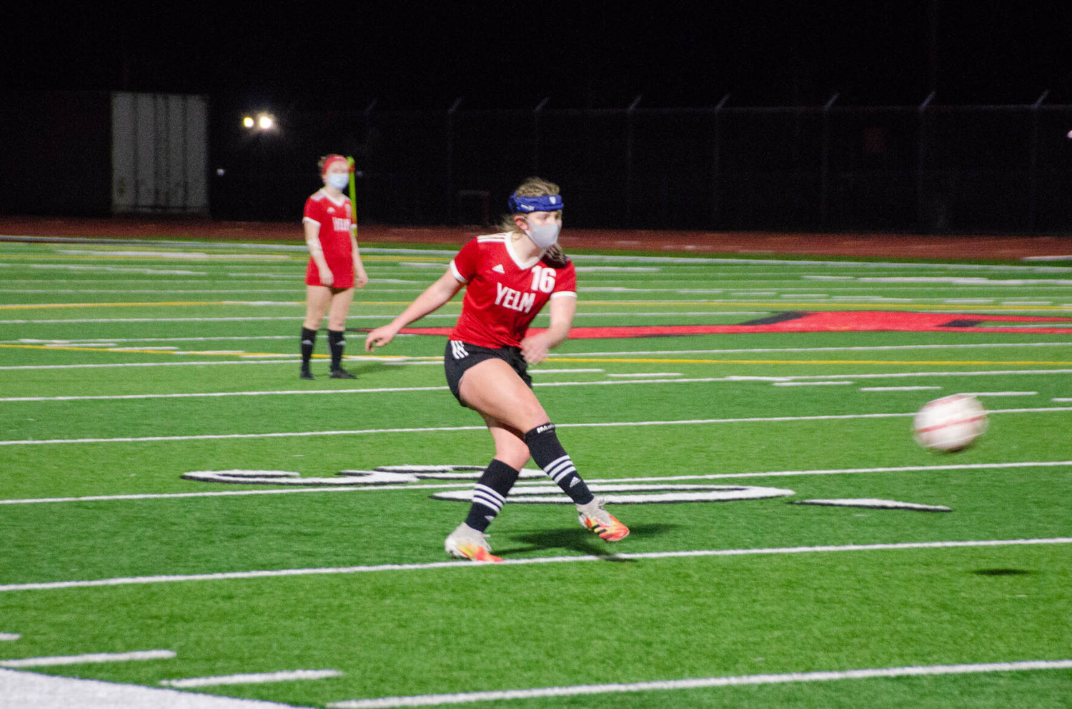 Sophomore midfielder Meridee Hill takes the free kick Tuesday in a home match against the River Ridge Hawks. 