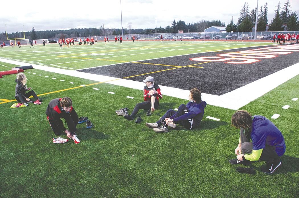 Yelm cross country runners lace up for a one-mile time trial hosted by the Tornados last December. 