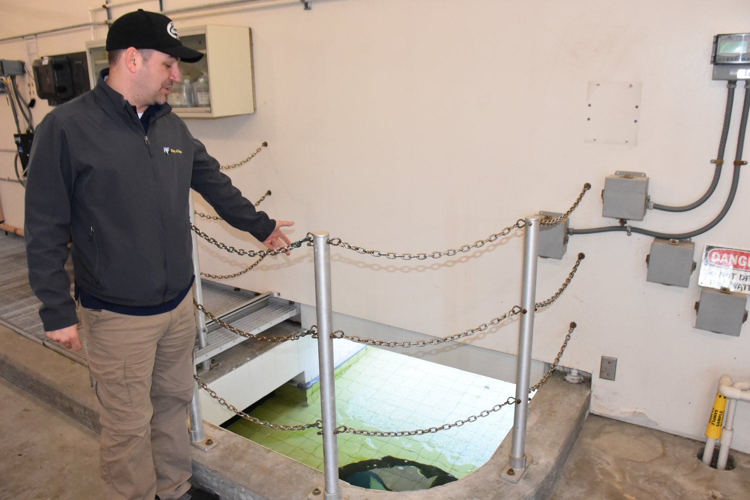 Cody Colt, Yelm Public Works director, describes how the reclaimed water is cleaned through a chlorinating process currently, and how UV light will disinfect the water in the future.