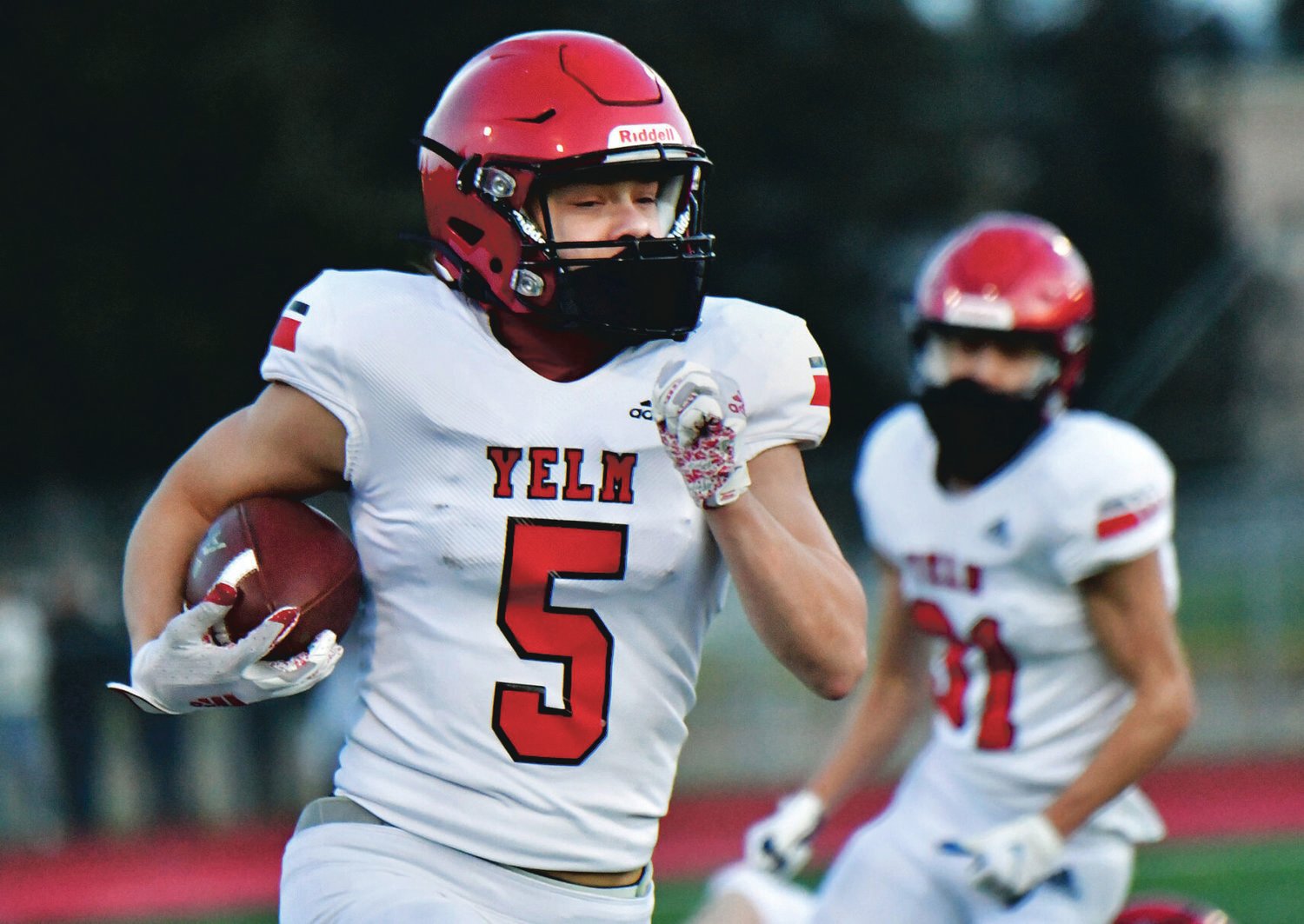 Yelm High School wide receiver Kyler Ronquillo jets upfield on Feb. 26, against River Ridge High School at South Sound Stadium.
