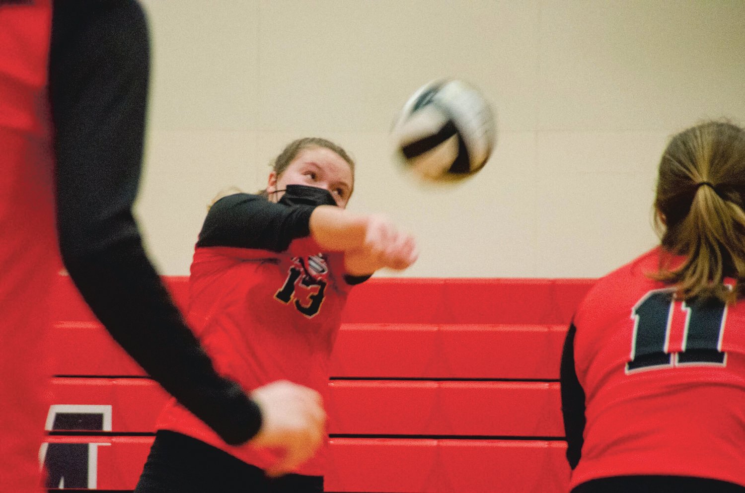 Molly Corak (left) is seen in her defensive roll at one of Yelm High School’s volleyball games during the 2020-21 season.
