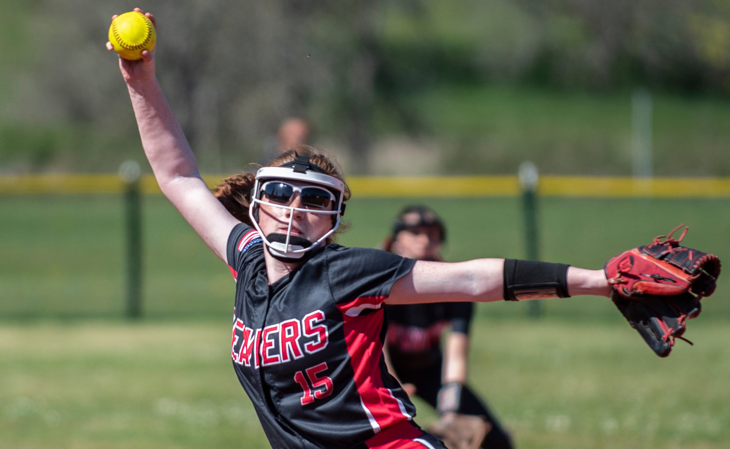 Tenino pitcher Emily Baxter winds up to deliver a pitch to an Elma batter.