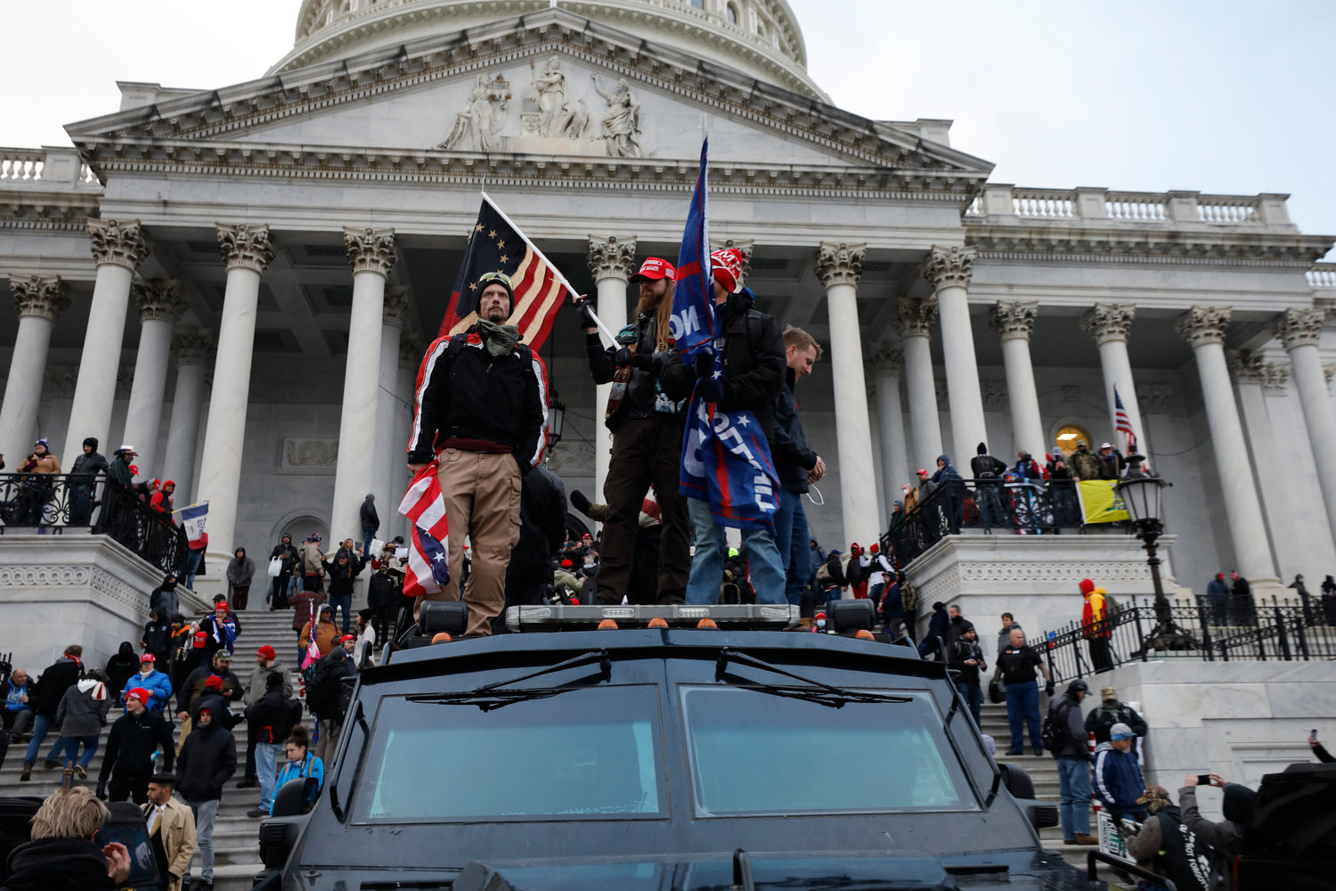 Supporters of President Donald Trump riot at the U.S. Capitol in Washington, D.C., on Wednesday, Jan. 6, 2021. House Democrats are asking for legislation to make sure that military personnel and recruits are not participating in extremist activities as was seen at the Capitol insurrection.(Yuri Gripas/Abaca Press/TNS)