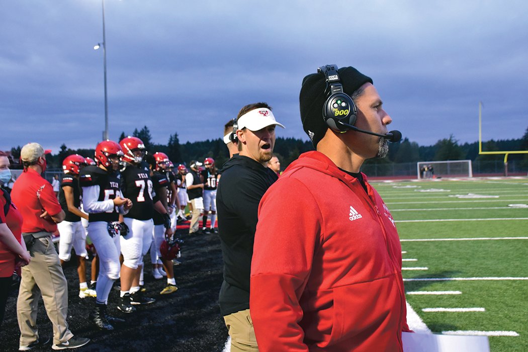 Tornados Coach Jason Ronquillo coaches the Yelm football team from the sideline on Friday, Sept. 17 at home.
