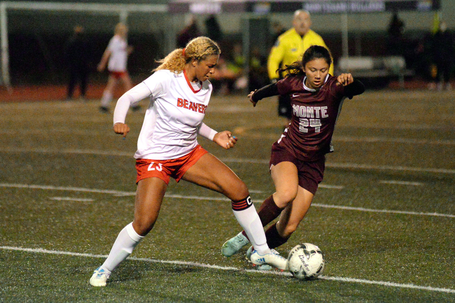 Tenino's Alivia Hunter (23) battles with a Montesano player during a match on Tuesday.
