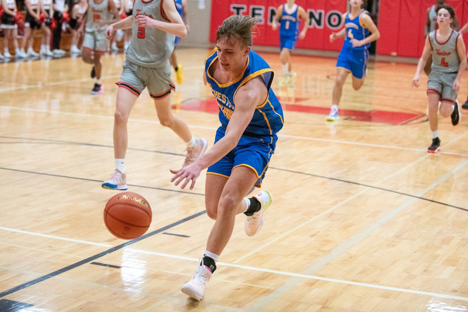 Rochester's Jyson O'Connor chases down a loose ball against Tenino on Nov. 29.
