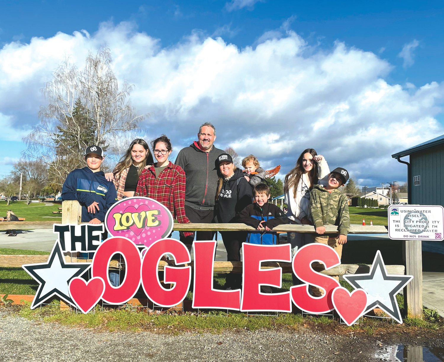 The Ogles, nine in all, host the annual Thanksgiving in a Basket program, which sources food and monetary donations to compile hundreds of meals for those in need each year.