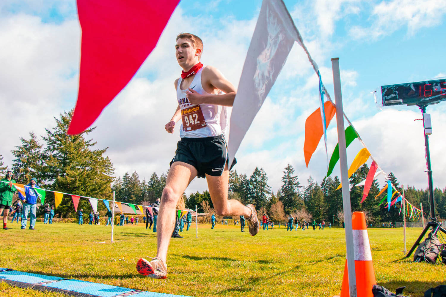 Bryce Cerkowniak runs during a cross-country meet at LBA Park in Olympia in March 2021.