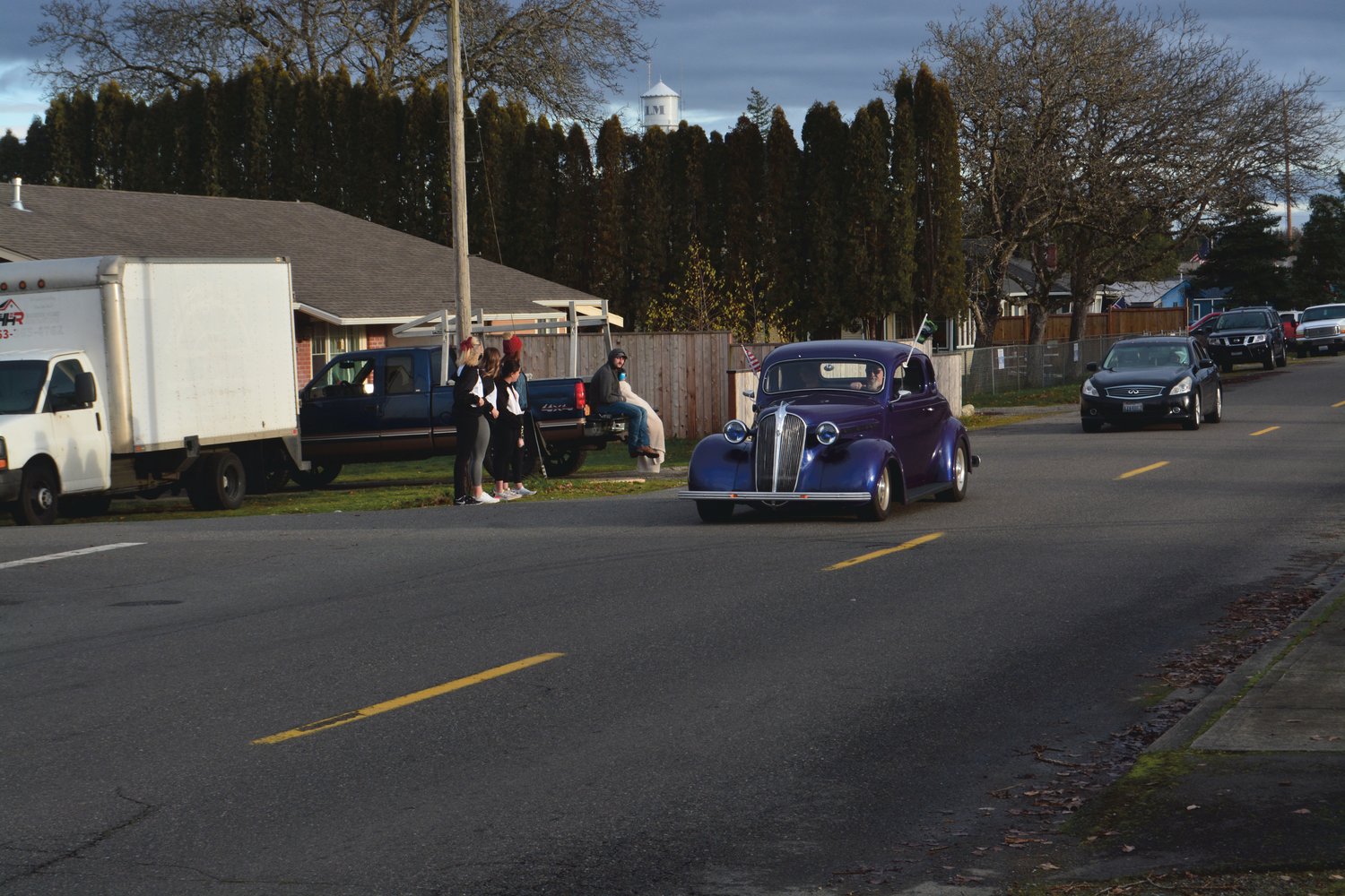 A man drives his car in the parade in support of Jeren Pollock on Jan. 8.