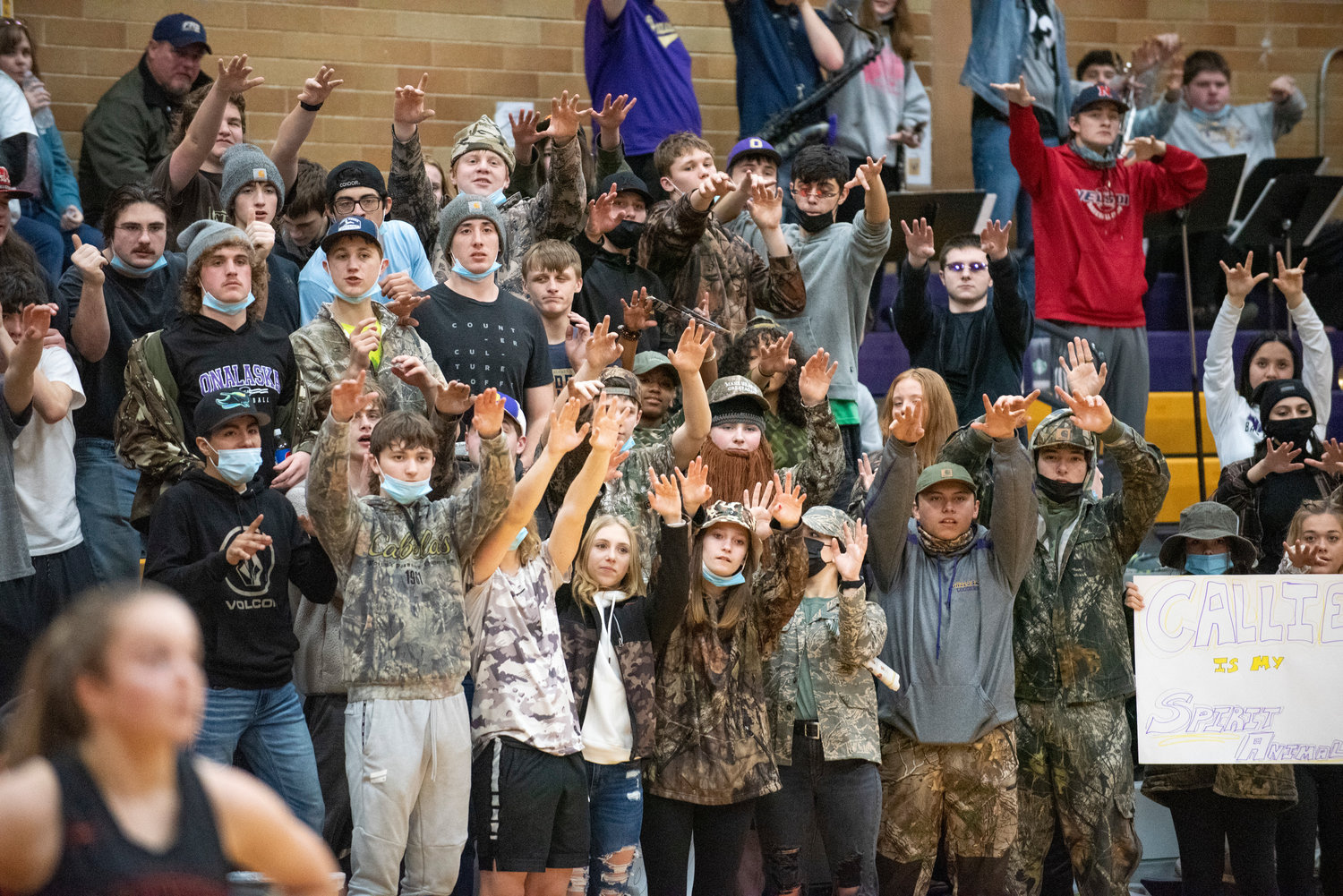 Onalaska's student section tries to jinx a Rainier free-throw shooter during a game on Jan. 20.
