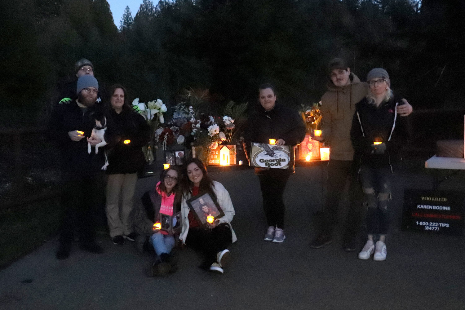 Friends and family of Karlee Bodine’s fiancee, Mitchell Davidson-Link, 33, who died unexpectedly in December, joined in a joint vigil for Davidson-Link and Karen Bodine near Rochester on Saturday. From left, Colton Hammons, Rick Gilbreath, Marci Hammons, Karlee Bodine, Taylor Bodine, Colleen Eshom, Kenny Eubanks and Erika Fagergren.