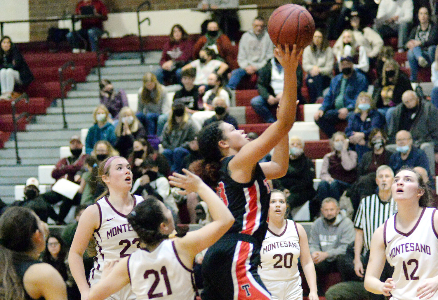 Tenino's Alivia Hunter drives to the bucket during a road game at Montesano on Feb. 4.