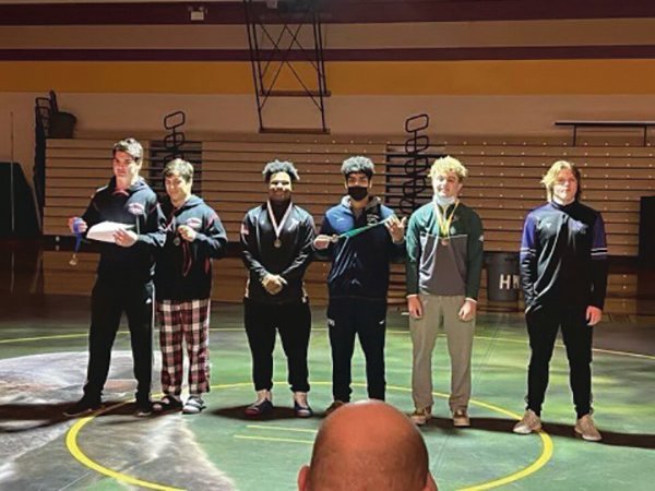Logan Platt and Ray Wright took first and second place, respectively, at the district tournament in the 195 pound weight class.