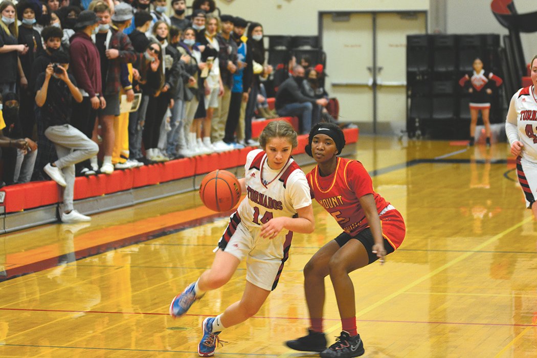 Sadie Tanner evades a Mount Tahoma defender before driving to the basket on Feb. 11.