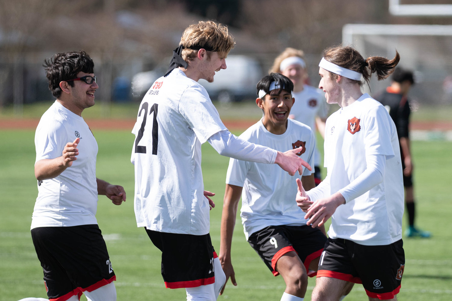Tenino celebrates its lone goal against Centralia in a 1-0 win at Tiger Stadium on March 19.