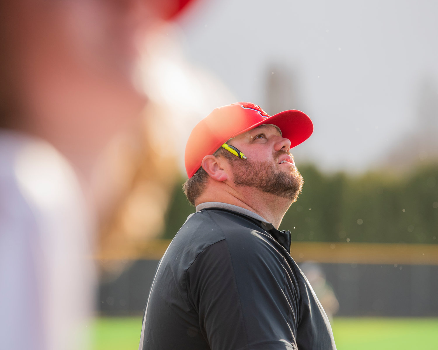 Tornado Baseball Coach Zach Miller looks on at foul ball Tuesday, March 15 during a game.