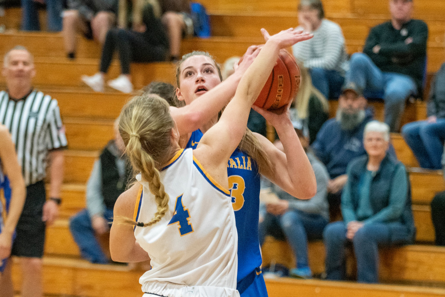 Winlock's Addison Hall shoots a jumper against Tumwater's Isabella Lund (4) during the SWW Senior All-Star Game on March 26.