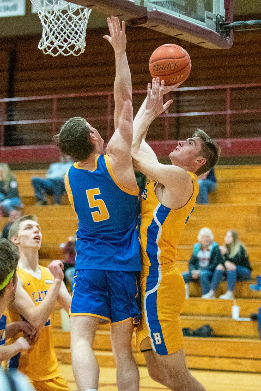 Centralia's Landon Kaut takes it to the hoops against Adna's Chase Collins (5) during the SWW Senior All-Star Game on March 26.