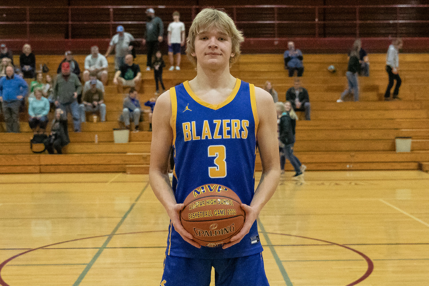 SWW Senior All-Star MVP Dirk Plakinger poses with the game ball after scoring 48 points at W.F. West March 26.