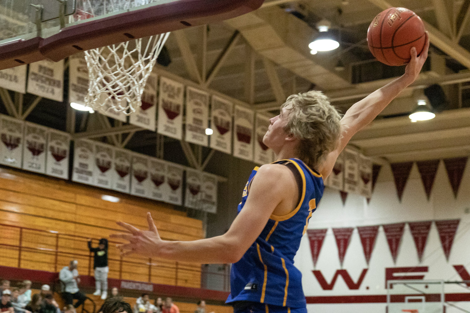 W.F. West forward Dirk Plakinger rises for a one-handed slam at the SWW Senior All-Star Game March 26 at W.F. West.