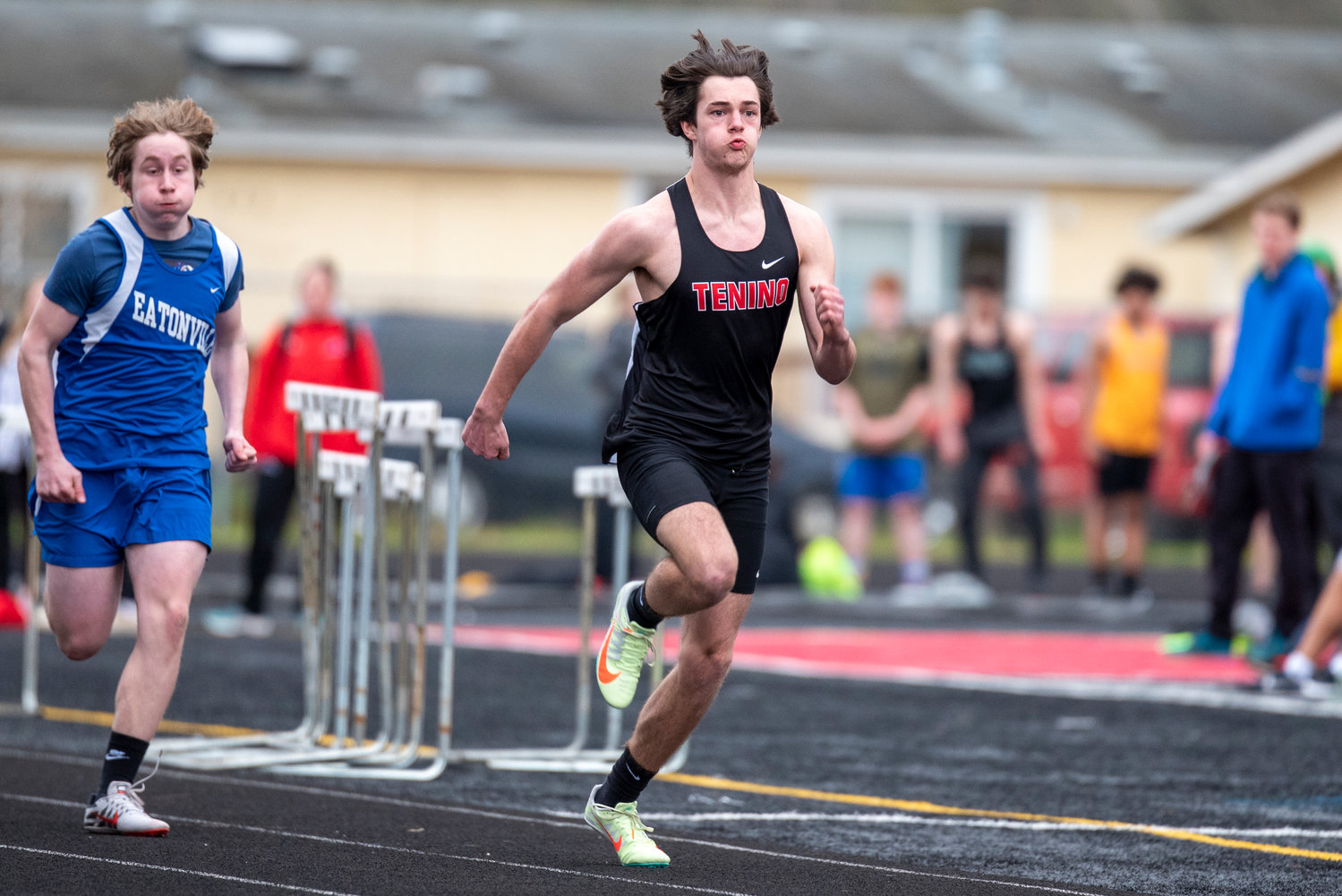 Tenino's Dylan Spicer takes off during the boys 100-meter dash at a home meet on March 29.