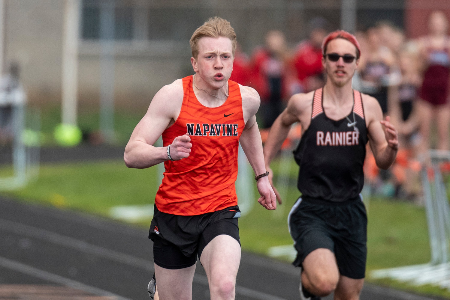 Napavine's Lucas Dahl sprints during the boys 100-meter dash during a home track meet on March 31.
