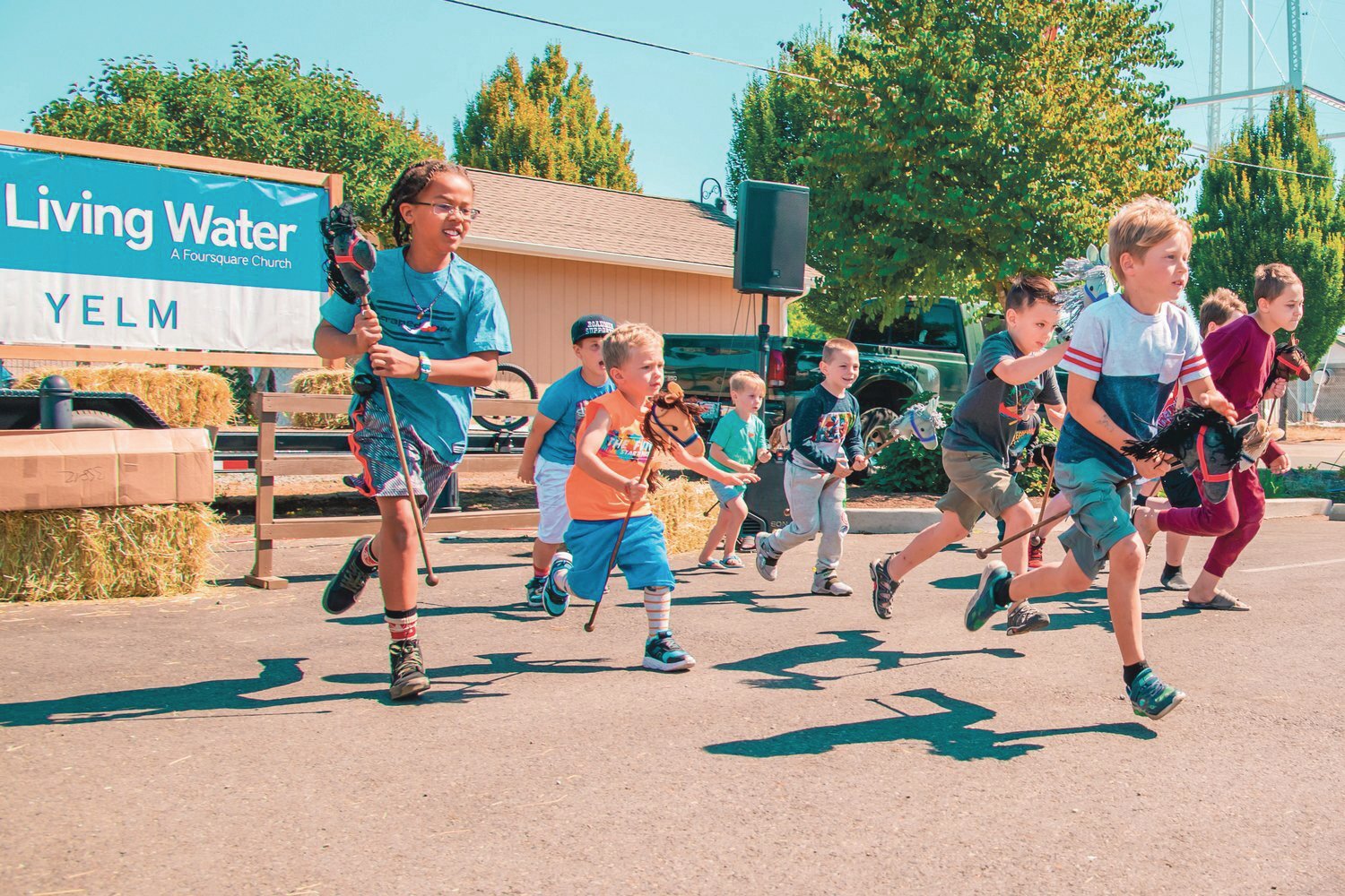 Brayden Czerniak leads during a race with stick-horses during Prairie Days at Yelm City Park in 2021.