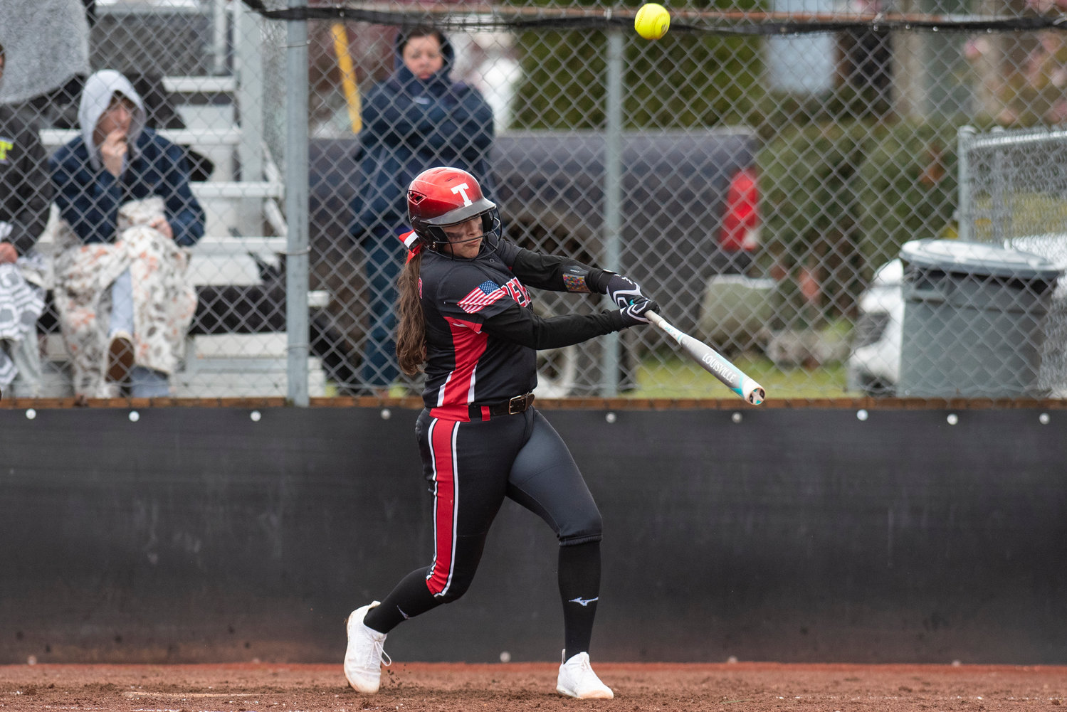 Tenino's Kiyah Goodwin connects on an Elma pitch during a home game on April 26.