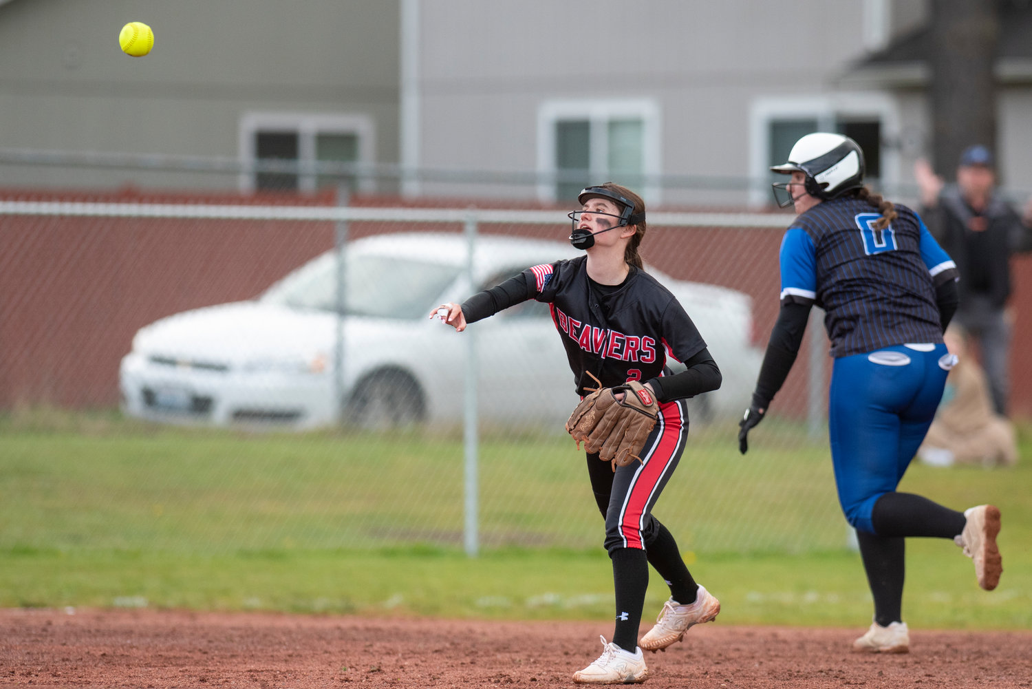 Tenino shortstop Kayla Feltus makes a throw to first base during a home game against Elma on April 26.