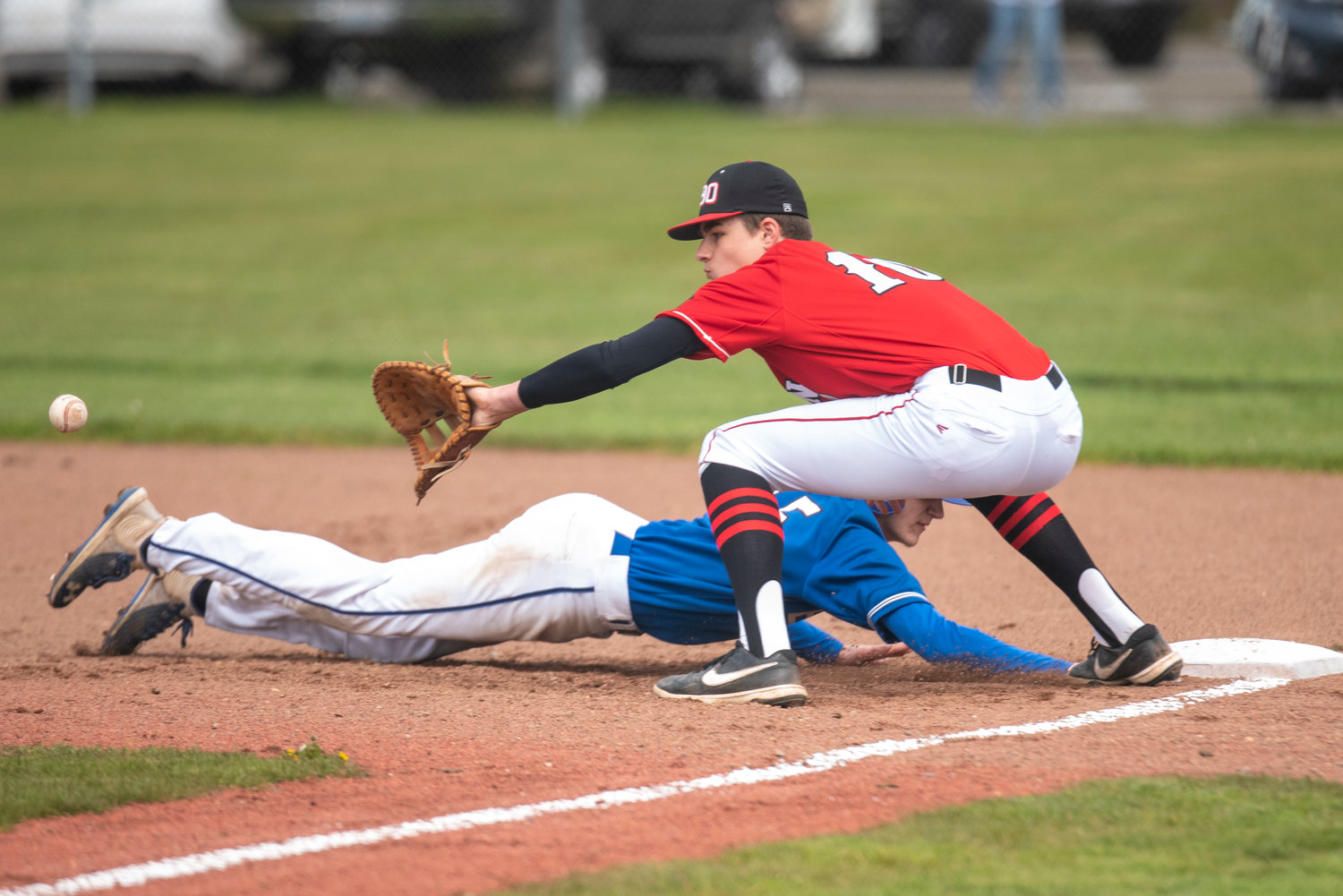 Tenino first baseman Jack Burkhardt awaits a pickoff attempt from pitcher Brody Noonan during a home game against Elma on April 29.