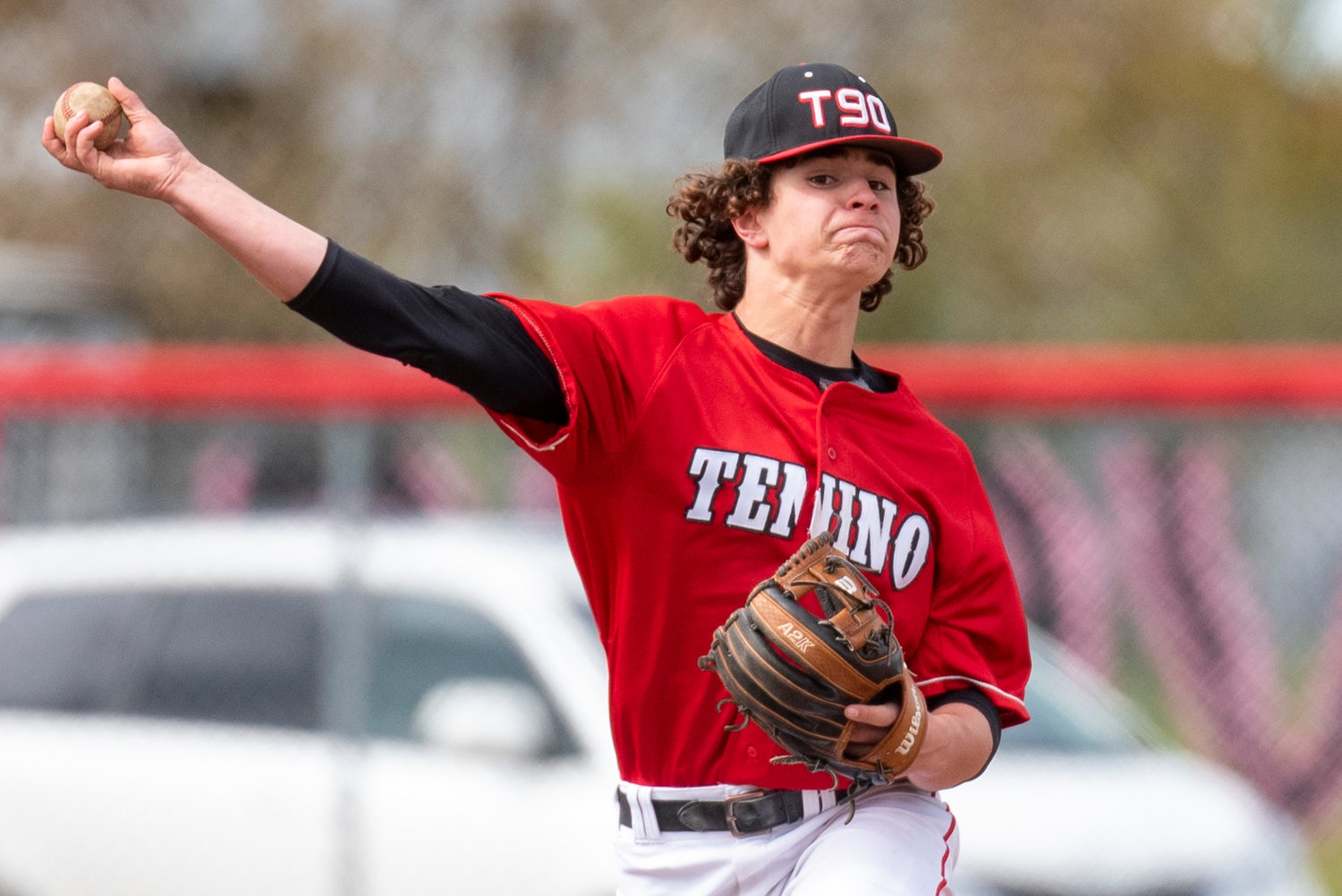 Tenino shortstop Eastin Snider makes a throw to first base during a home game against Elma on April 29.