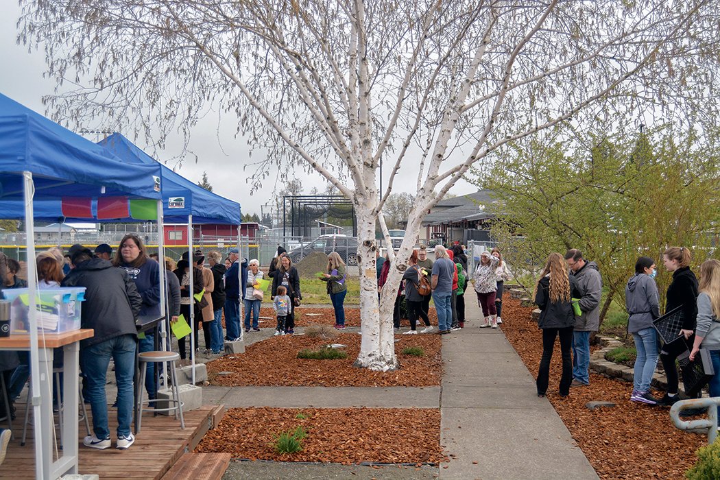 Customers of the Yelm FFA’s Plant Sale wait in line to purchase plants during the annual plant sale at Yelm High School on April 28.