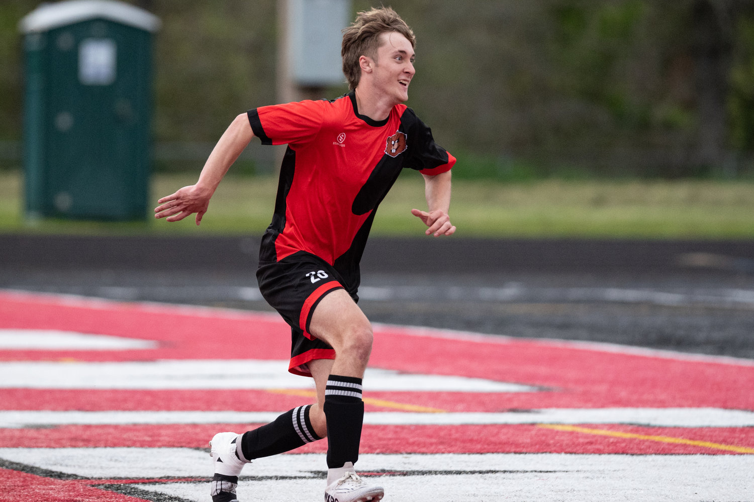 Tenino's Triston Whitaker celebrates after his goal in the second half of a win against Ilwaco May 4.