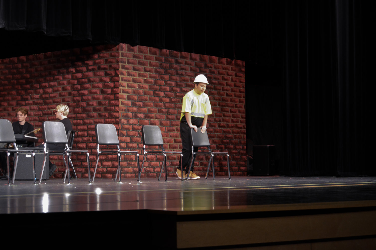 A.J. Hicks performs his rendition of “Iron Worker” during the musical titled "Working."