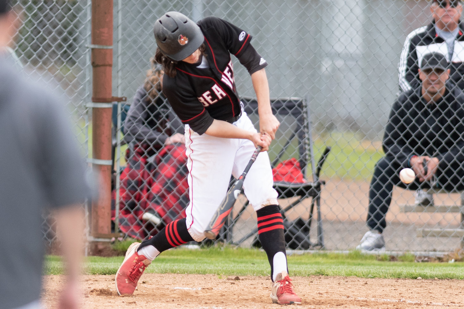 Tenino's Brody Noonan swings low at a pitch against King's Way Christian May 13 in the 1A Evergreen District playoffs in Castle Rock.