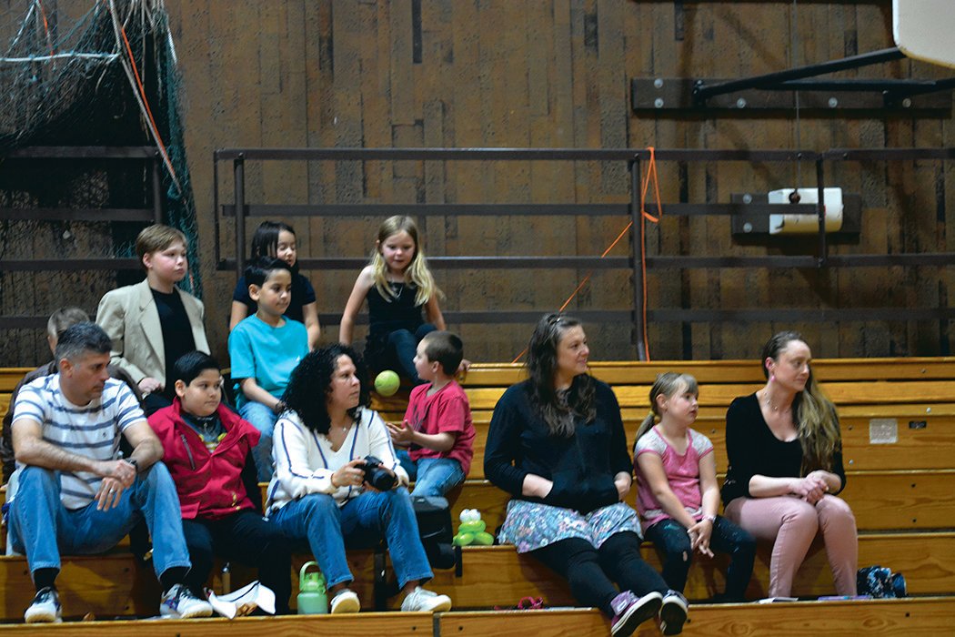Attendees at the Rainier Community Talent Show watch performances on May 14.