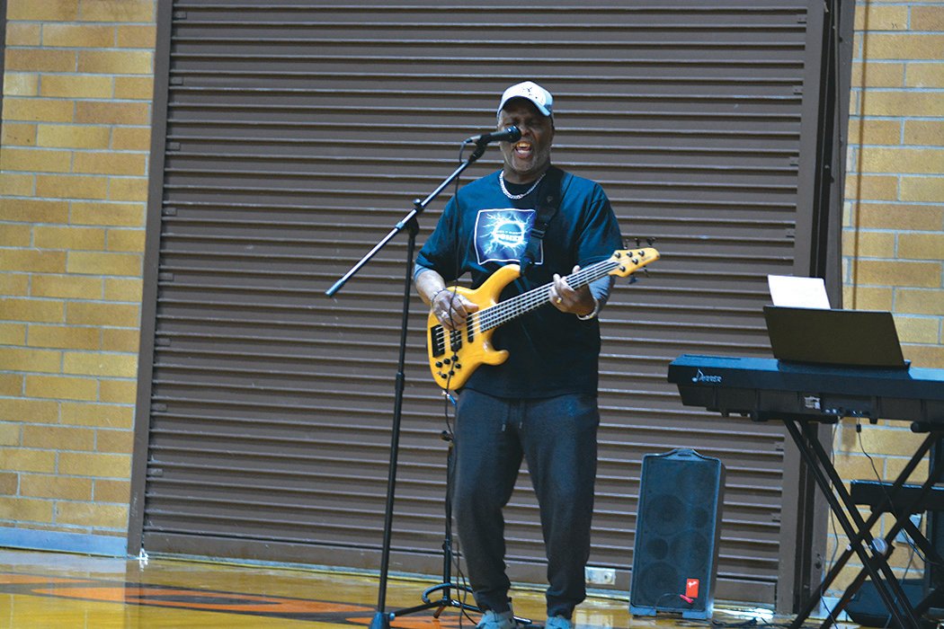 Pastor Kurt Carter performs a biblical song at the Rainier Community Talent Show on May 14.