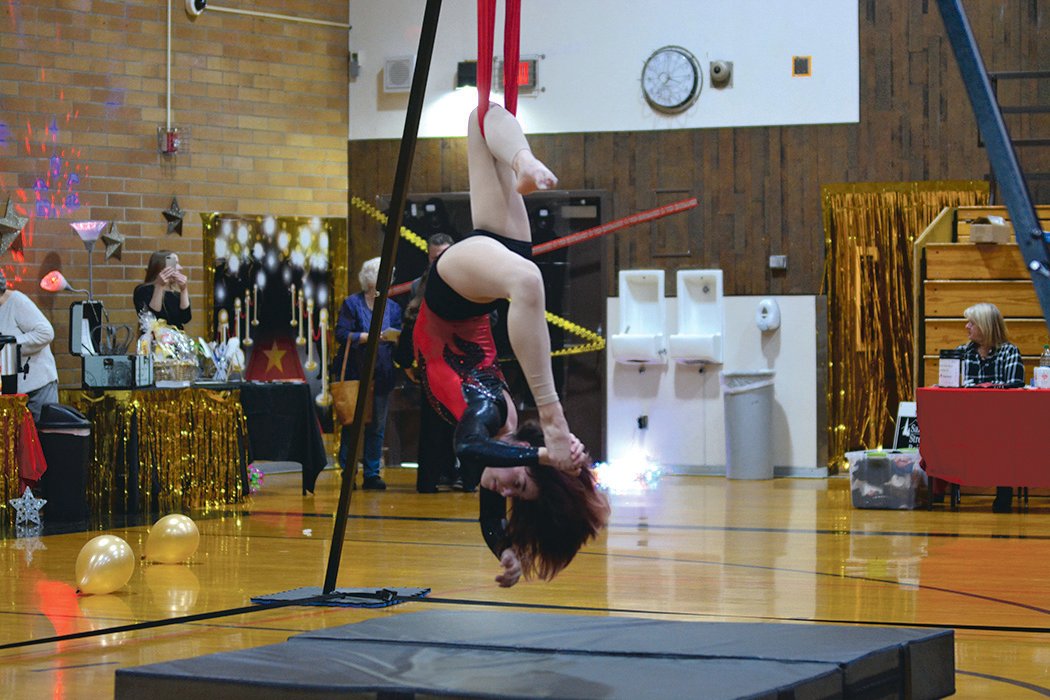 One of three acrobats performs at the Rainier Community Talent Show on May 14.