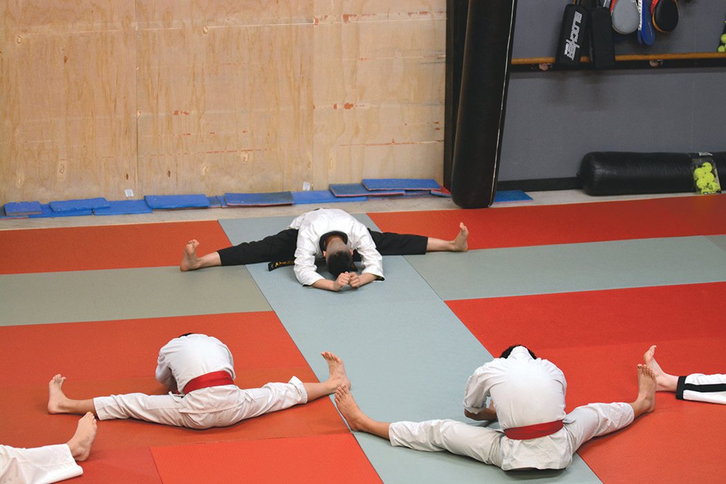 Students warm up for their 6 p.m. class on Friday, May 20 at Rainier Martial Arts.