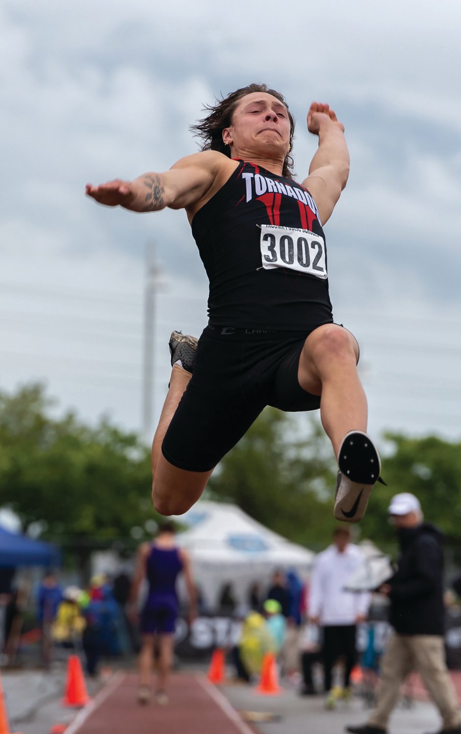 Yelm's Kyler Ronquillo long jumps at the 2A/3A/4A State Track and Field Championships on Thursday, May 26, 2022, at Mount Tahoma High School in Tacoma. Ronquillo finished third in the event with a jump of 22 feet, 5.5 inches.