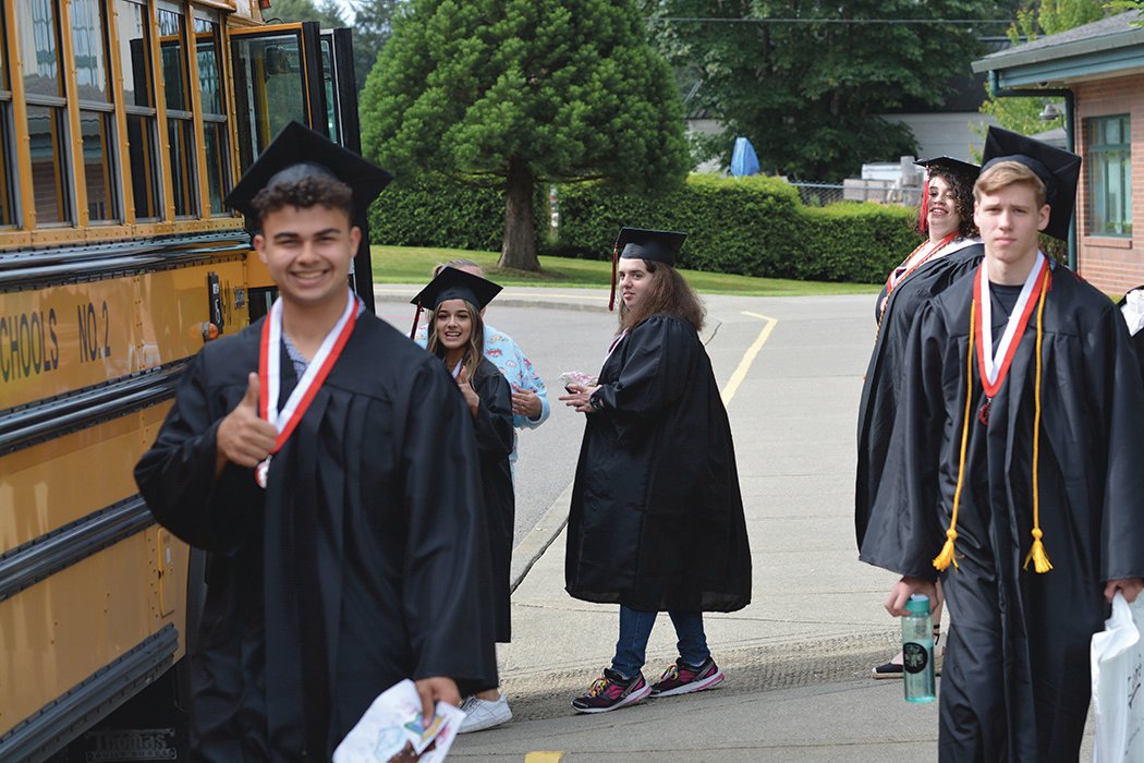 Students file out of McKenna Elementary School on June 15 after the annual grad walk.