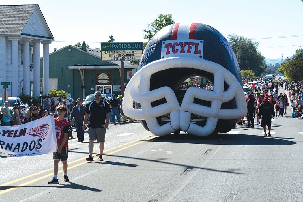 A truck sports an inflatable tunnel used by TCYFL teams during the Prairie Days Parade.