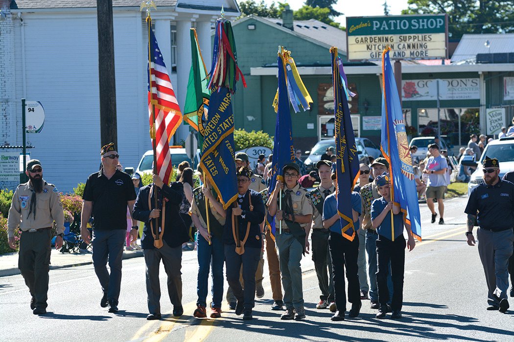 Local scouts present the colors during the Prairie Days Parade.