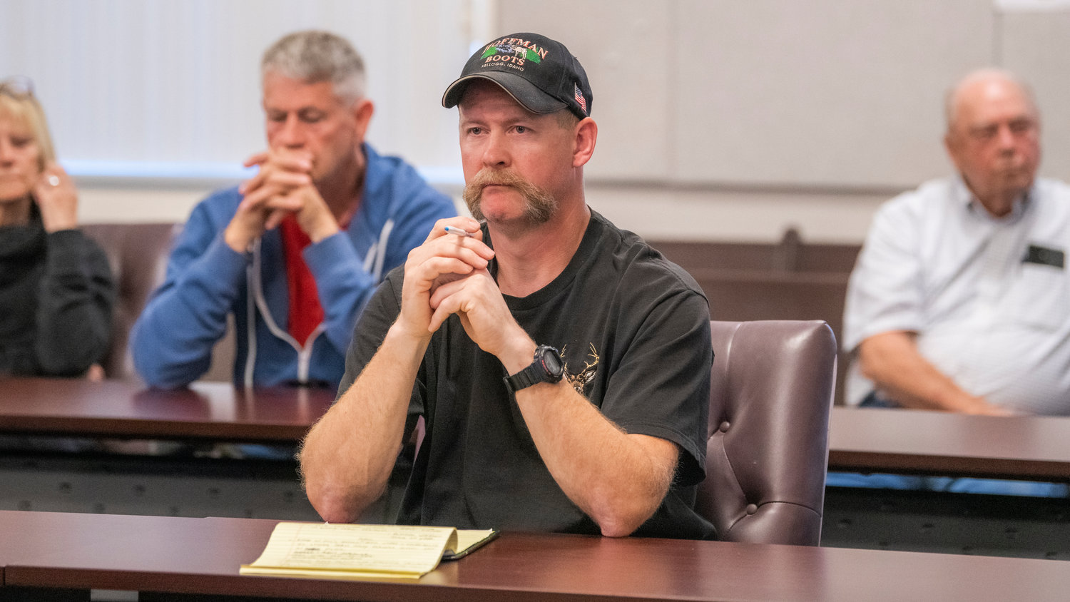 Mineral resident Mark Waters attends a Lewis County Planning Commission meeting at the Lewis County Courthouse in Chehalis Tuesday evening as the board workshops a rezone proposal north of Mineral Lake.
