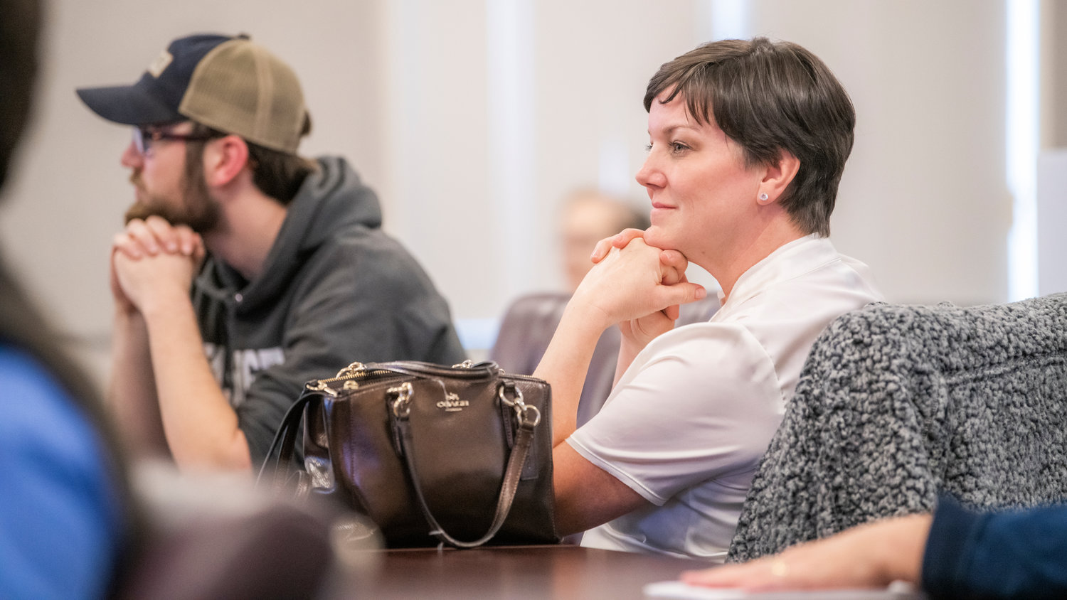 Tyra Larson, a Mineral resident, listens during a Lewis County Planning Commission meeting at the Lewis County Courthouse in Chehalis on Tuesday evening.