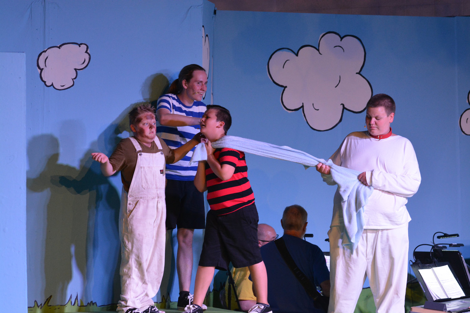 Snoopy, Linus, Schroeder and Pig-Pen argue over Linus’ blanket during a performance by Tenino Young-at-Heart Theatre on Thursday, July 28.