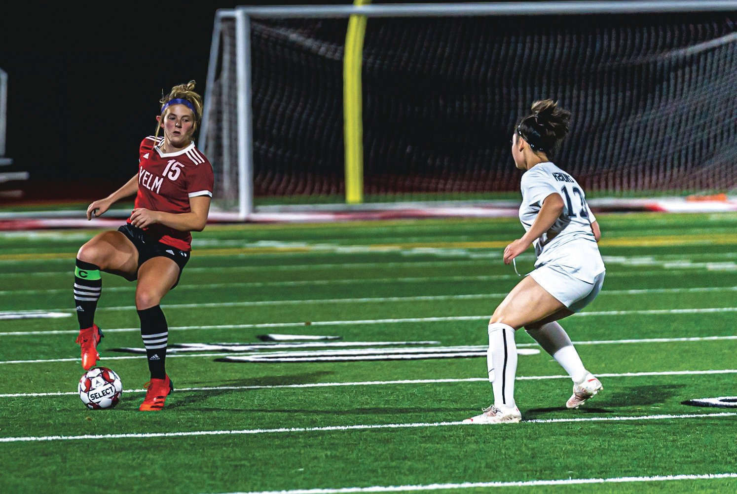 Meridee Hill dribbles the soccer ball during a 2021 Yelm girls soccer matchup.