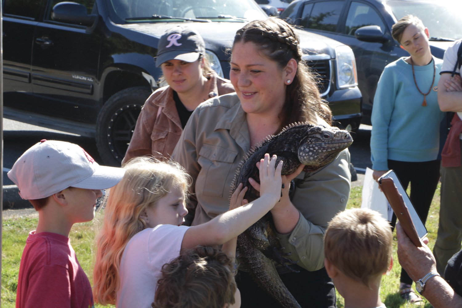 The Reptile Lady showcases a reptile to enthusiastic children at the 33rd annual Nisqually Watershed Festival on Sept. 24.